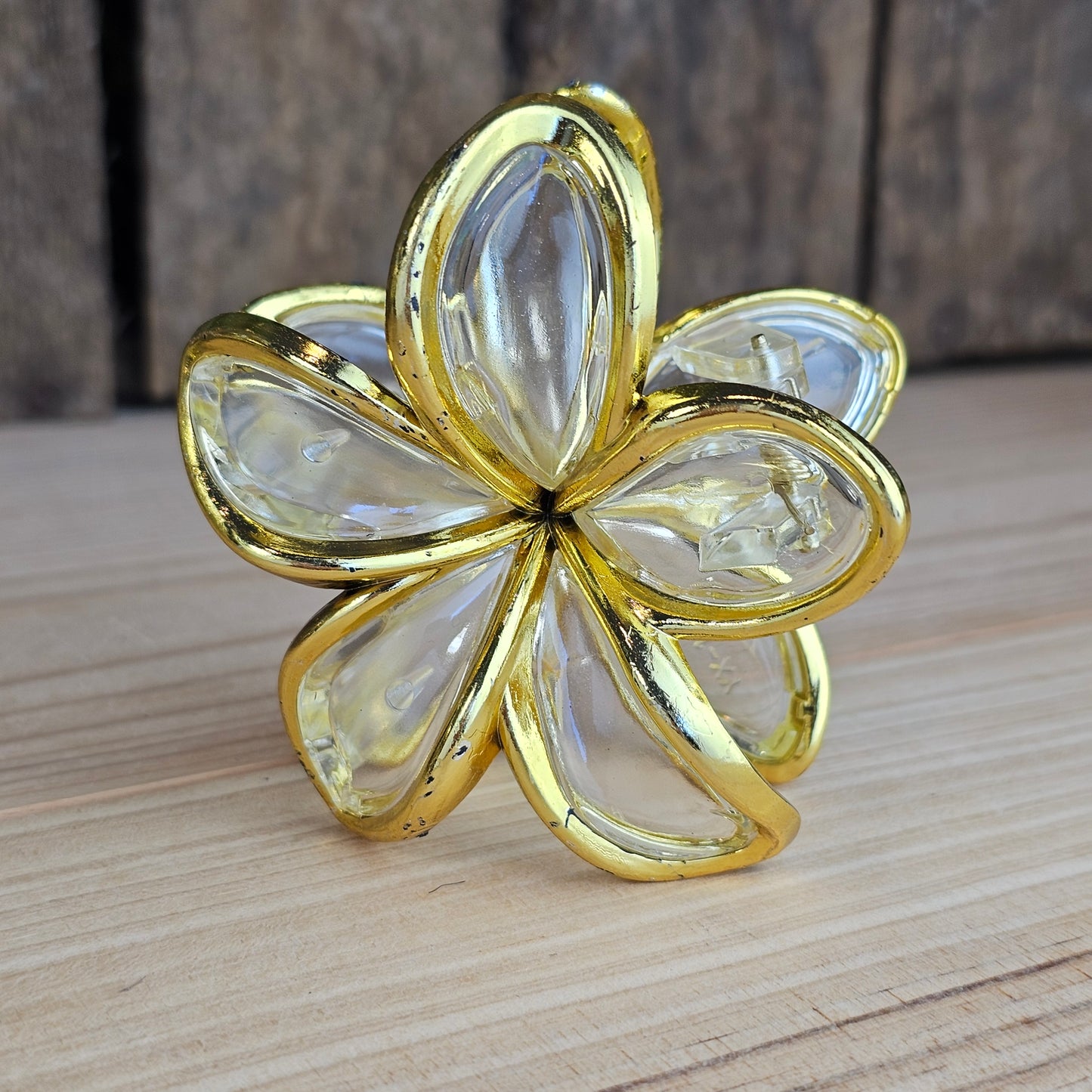 Pince cheveux fleur dorée et transparent