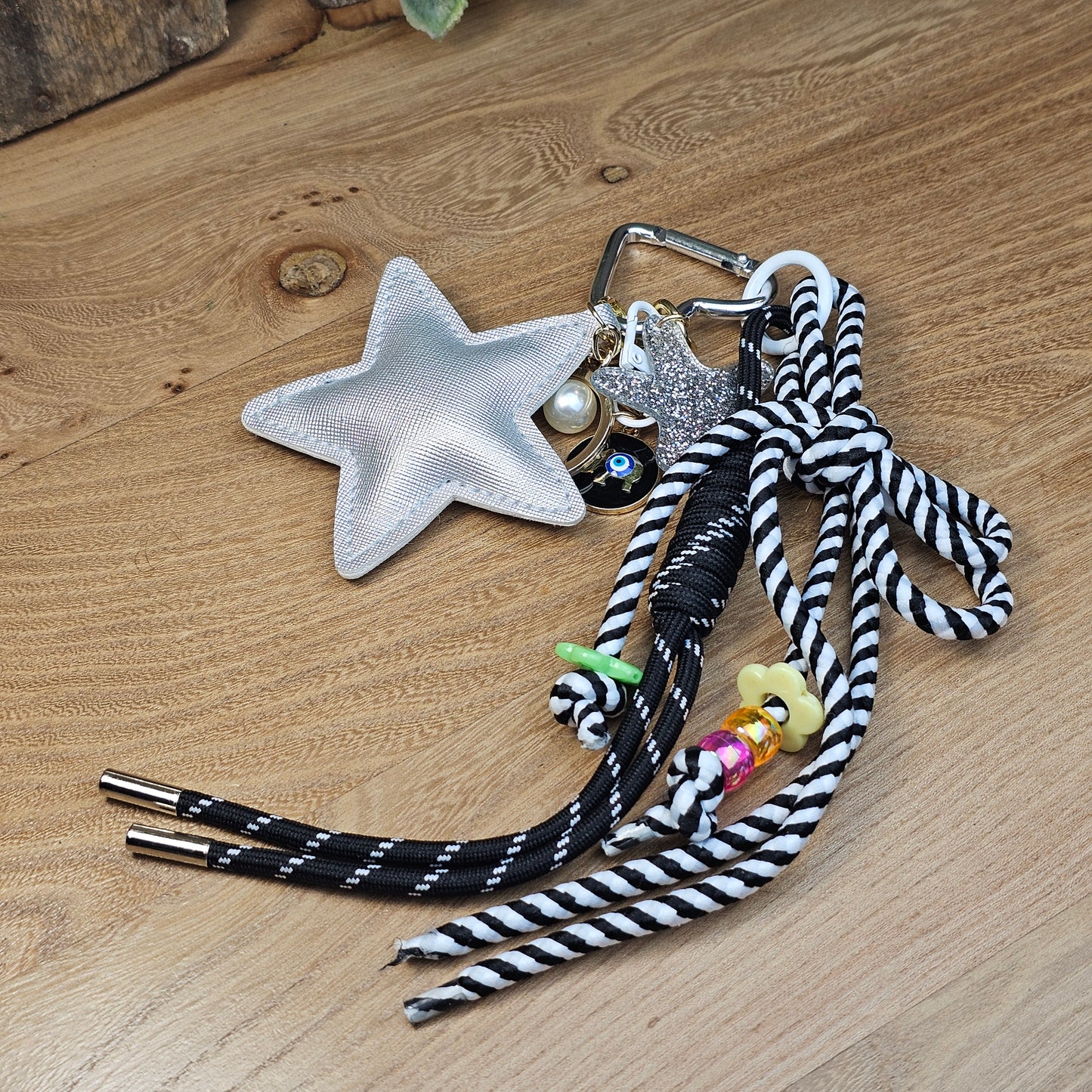 Porte-clés grigri étoile argenté