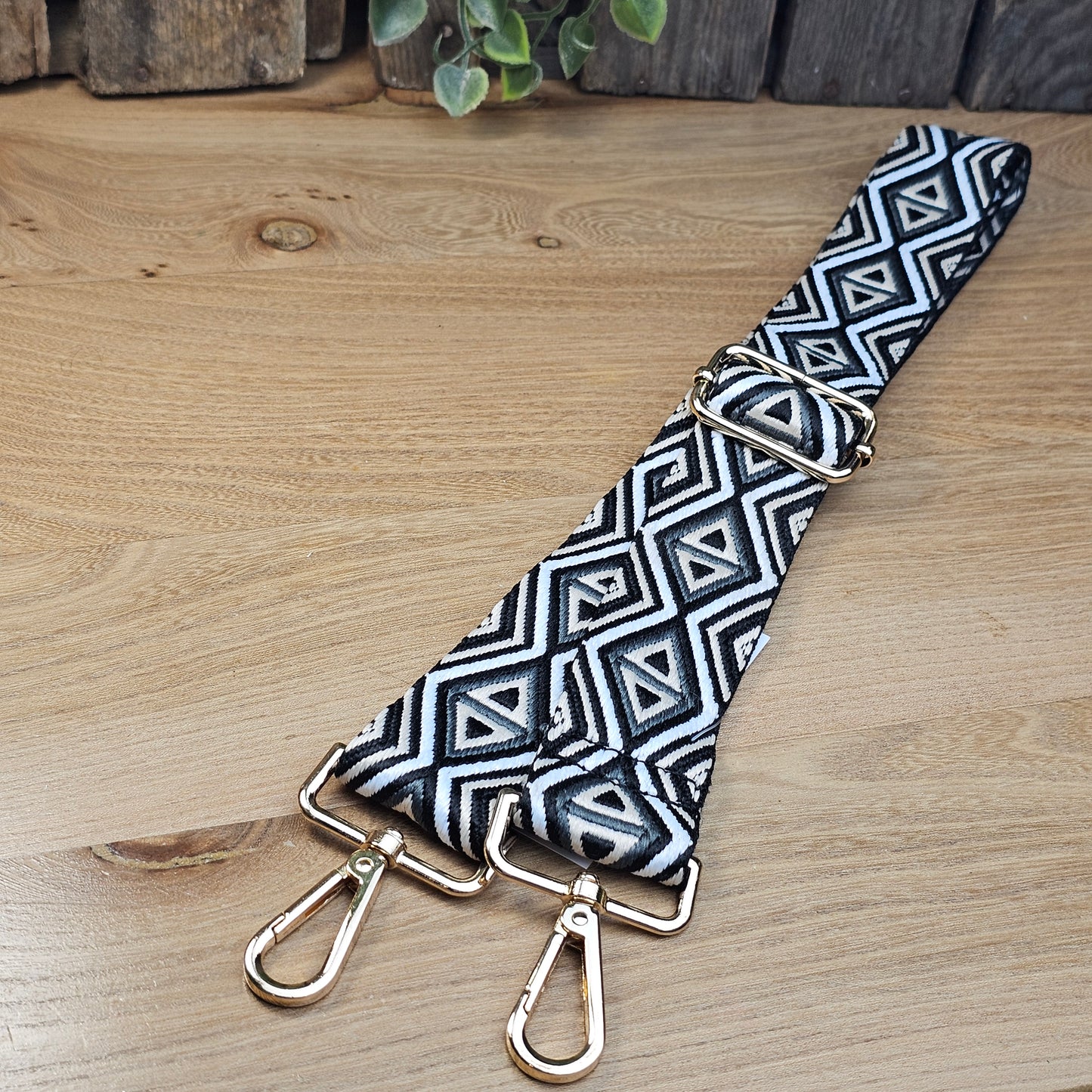 Bandoulière motifs géométrique noir