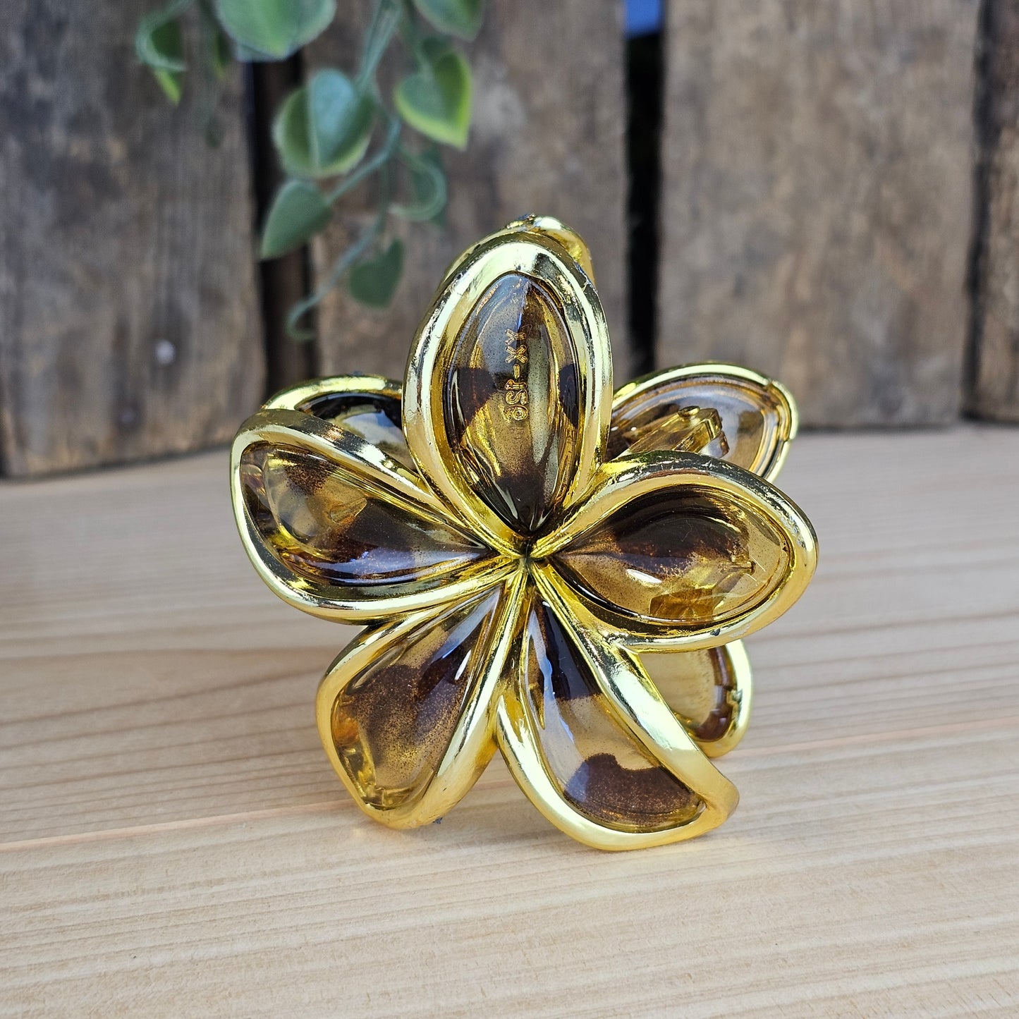 Pince cheveux fleur dorée et léopard marron