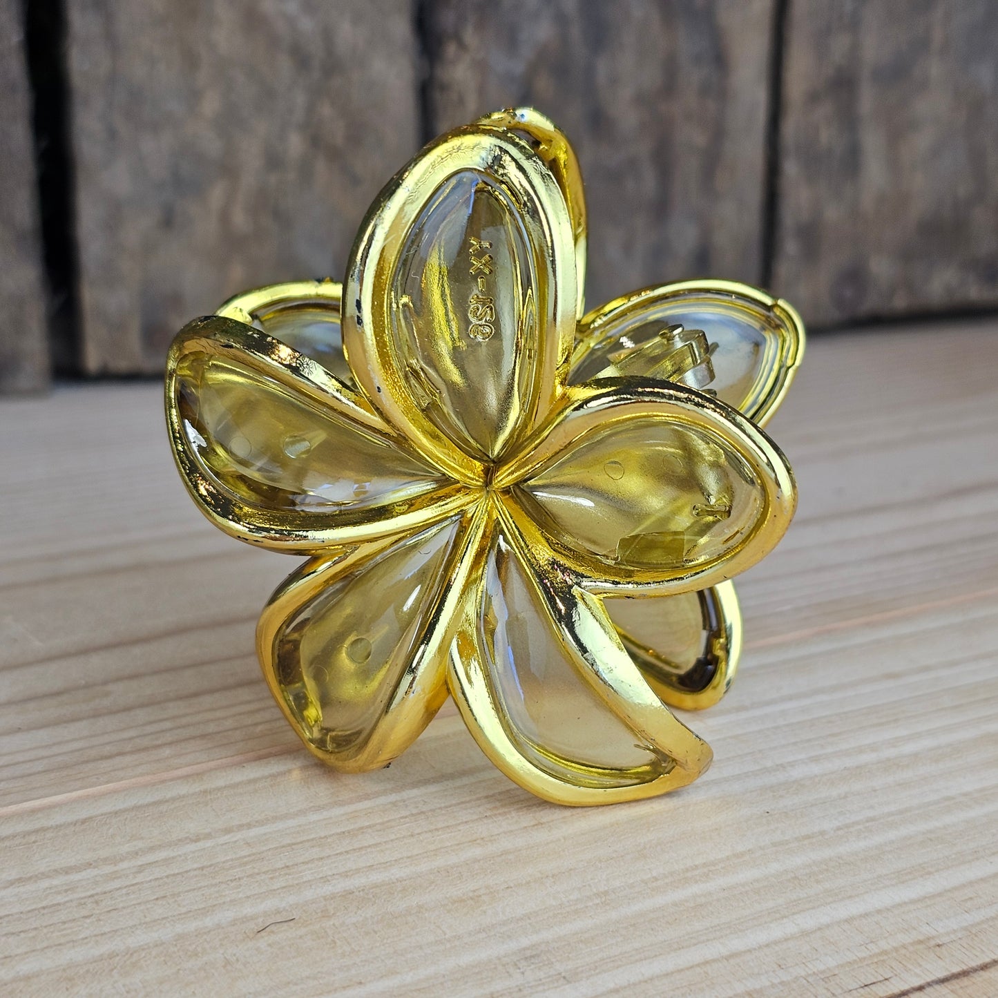 Pince cheveux fleur dorée et tranparente ocre
