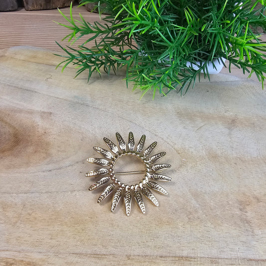 Broche soleil