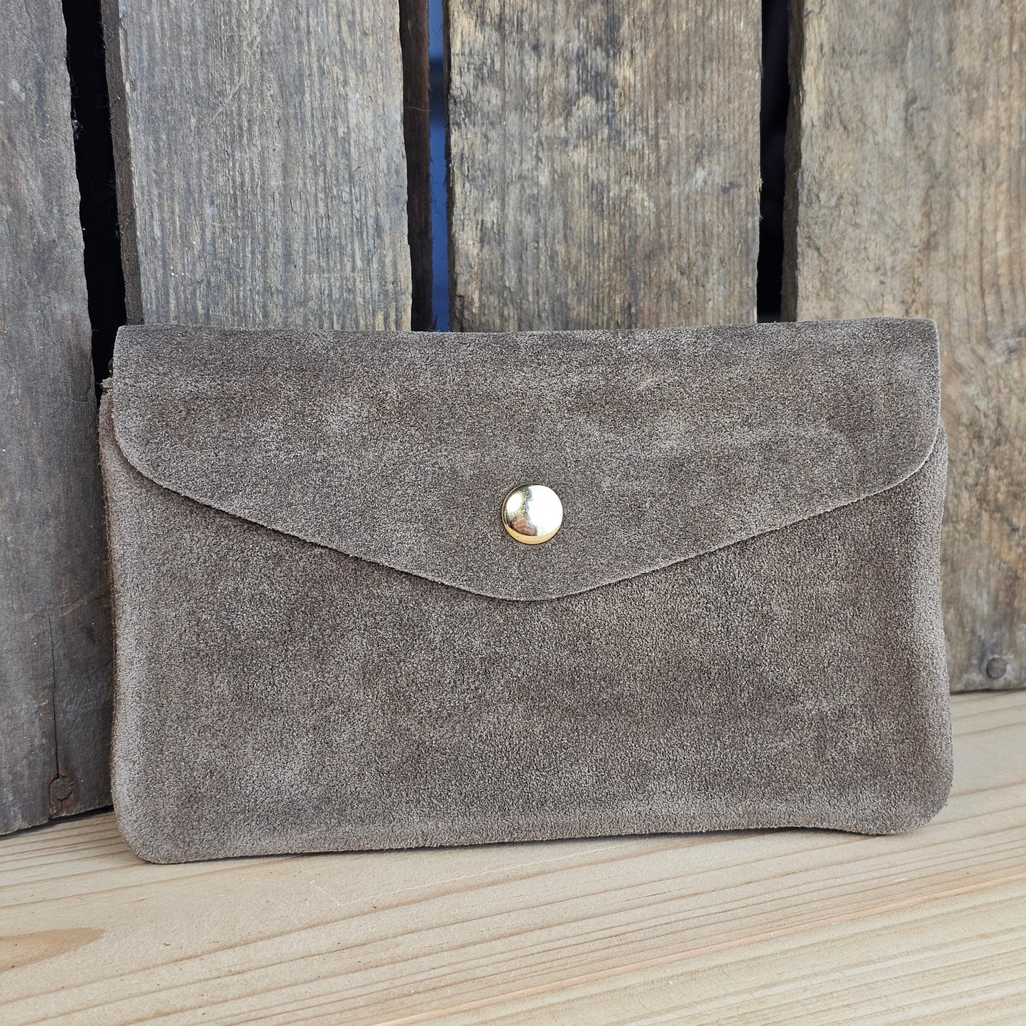Grand porte monnaie en daim taupe