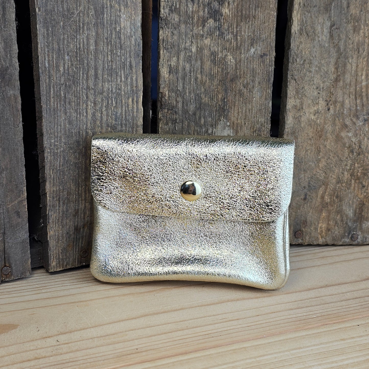 Porte monnaie en cuir doré