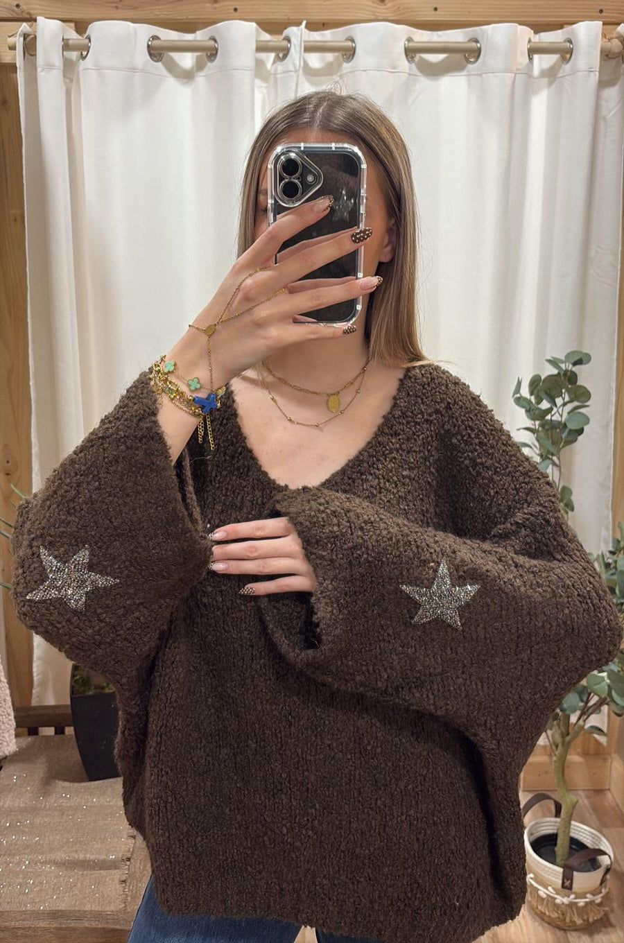 Pull bouclette étoile sur les manches marron