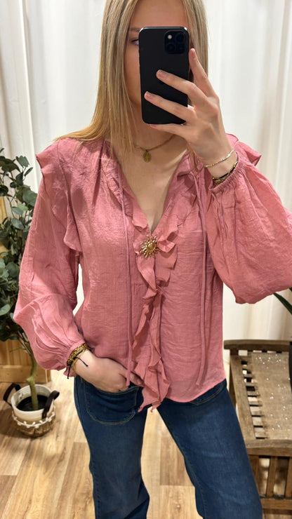 Blouse rose broche soleil