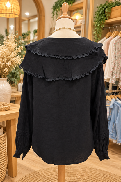 Blouse à volants noire